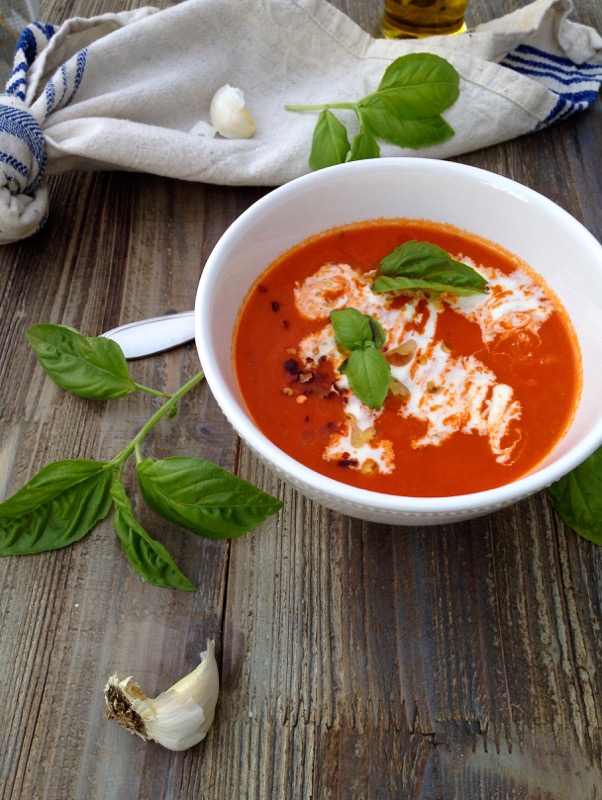  White Bowl of San Marzano Tomato Soup on a Rustic Table