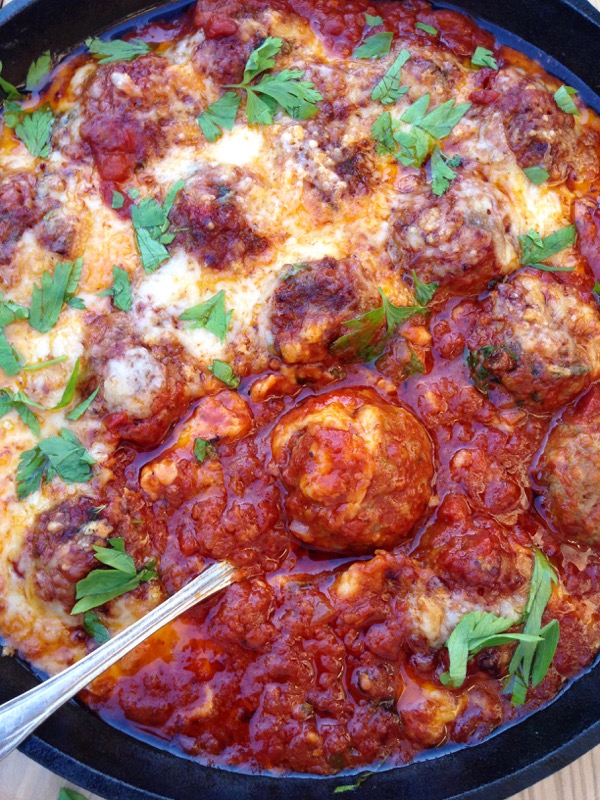 Italian Ricotta Meatballs in Arrabiata Sauce covered in Melted Fontina Cheese