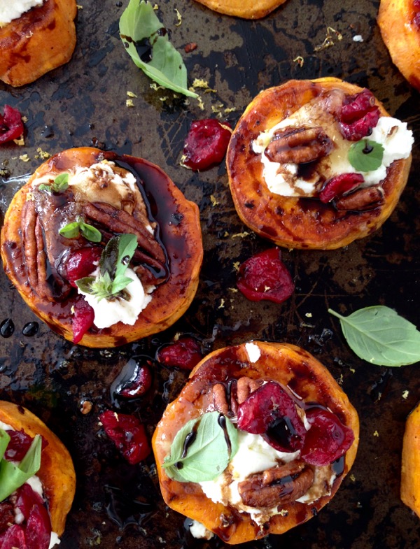 A Tray Of Sweet Potato Appetizers with Goat Cheese, Nuts, Honey & Balsamic Glaze