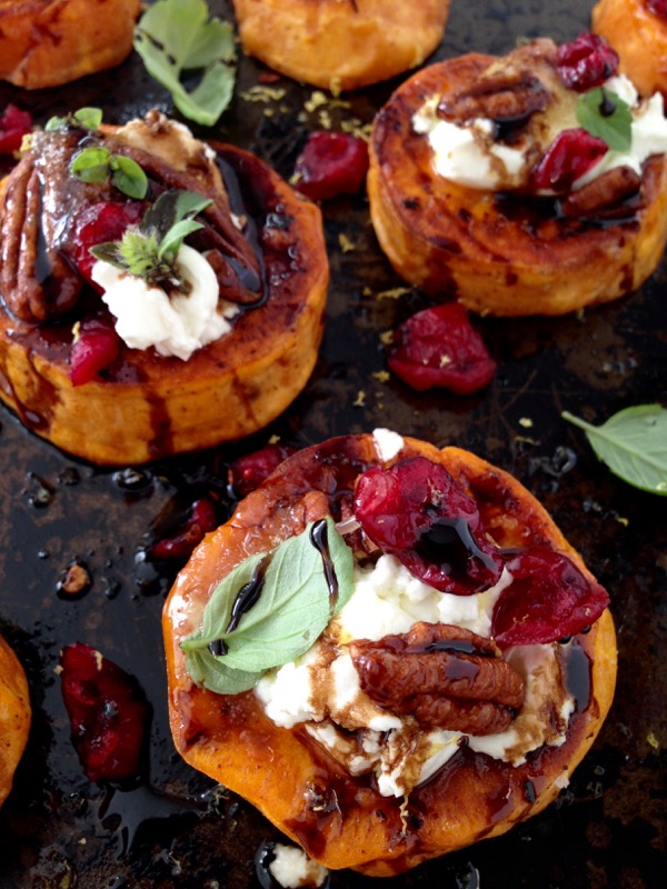 A Tray Of Sweet Potato Appetizers with Goat Cheese, Nuts, Honey & Balsamic Glaze