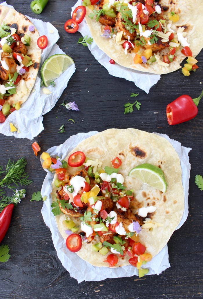 Mexican Style Shrimp Tacos on a Wood Table