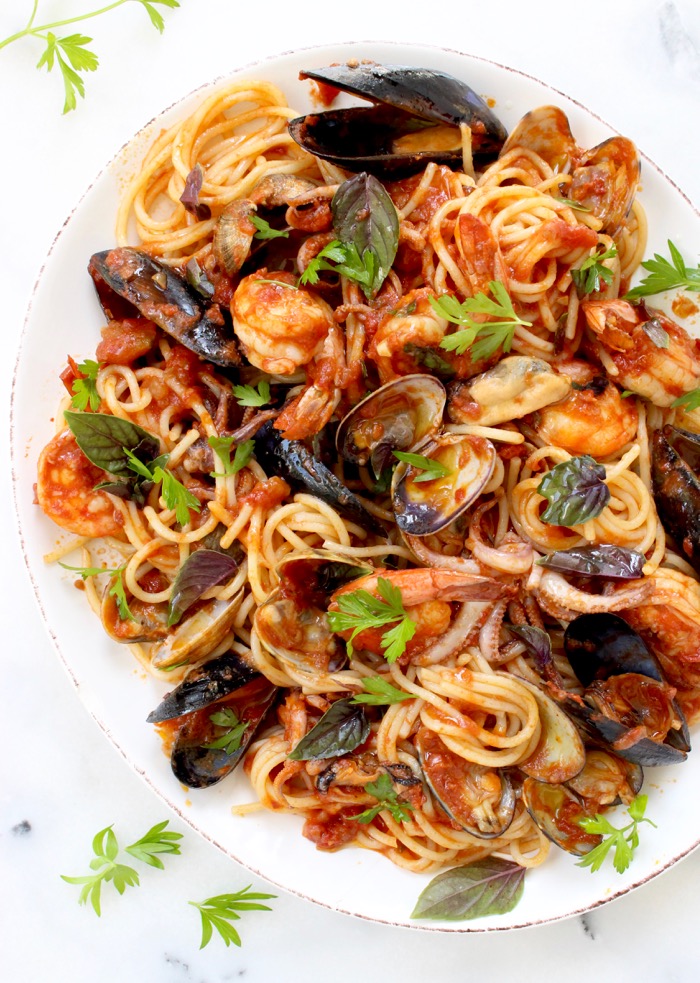 Serving Plate of Spaghetti Frutti di Mare with a Mix of Seafood: Clams, Mussels, Shrimp and Squid