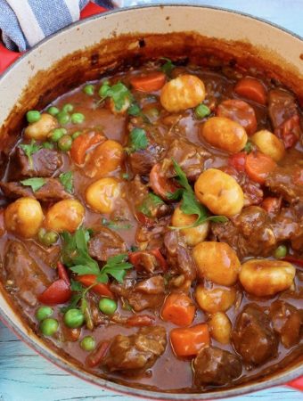 Red Pot Of Beef Stew with Gnocchi Dumplings