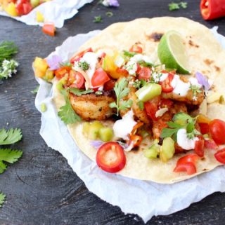 Grilled Mexican Shrimp Tacos with Salsa Fresca and Crema on Charred Flour Tortillas