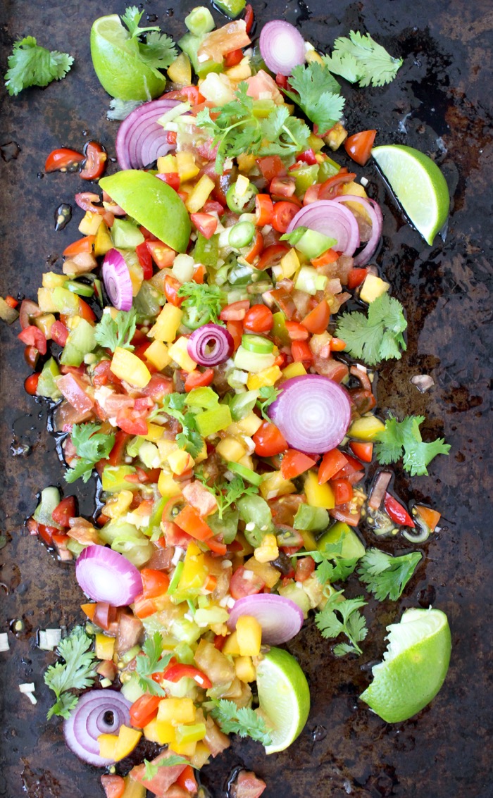 Black Platter of Colorful Heirloom Fresh Tomato Salsa with Red Onion, Cilantro and Lime
