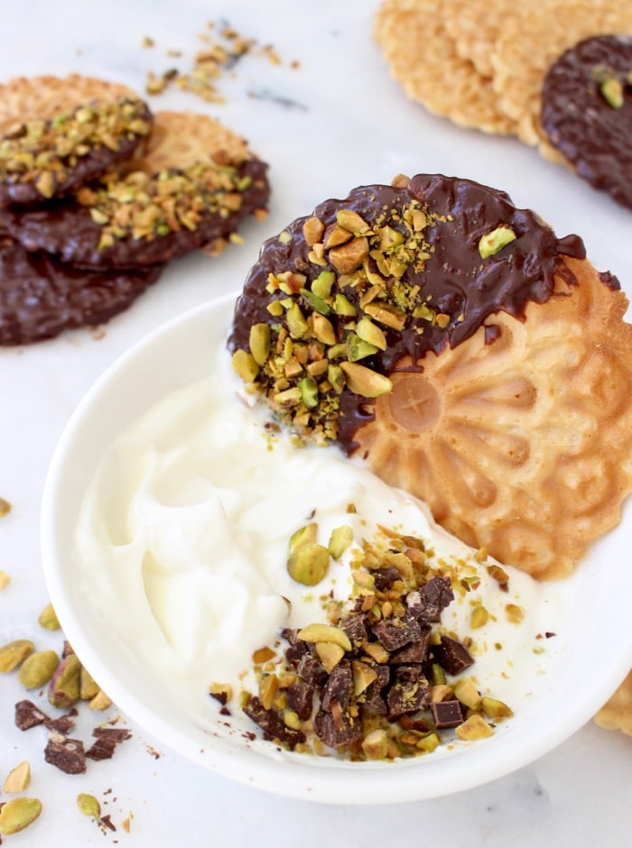 Chocolate Dipped Pistachio Pizzelle Cookies with Cannoli Filling