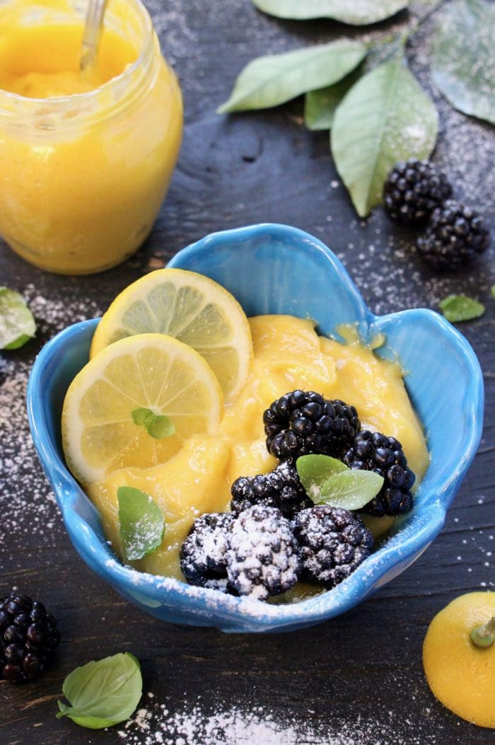 Easy Lemon Curd Filling topped with Blackberries, Basil and Powdered Sugar
