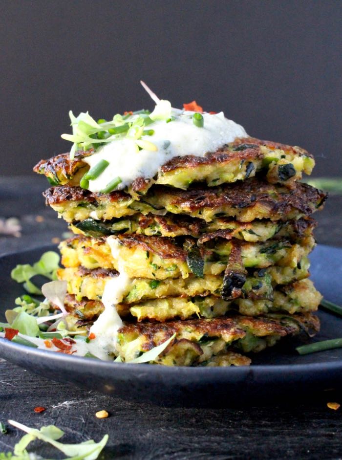 Stack of Zucchini Fritters with Panko Bread Crumb and Tzaziki Sauce 