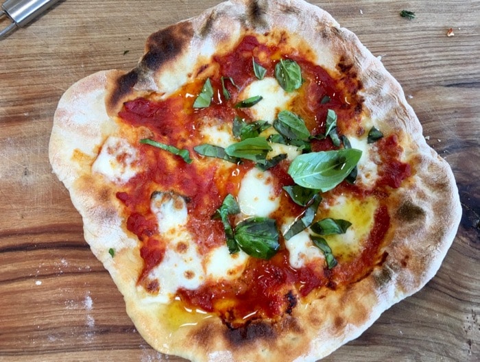 Thin Crust Pizza Margherita on Wooden Board
