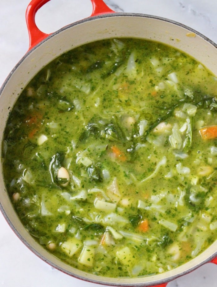 Italian Green Red Pot of Minestrone di Verdure Soup with Pesto, Cabbage and Potatoes