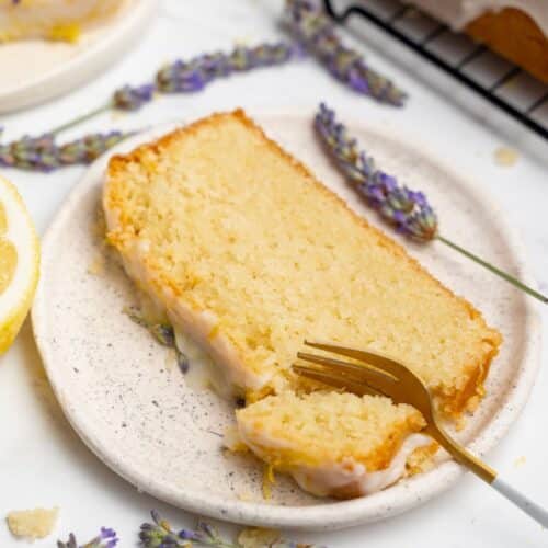 sliced lemon loaf with lemon glaze and lavender